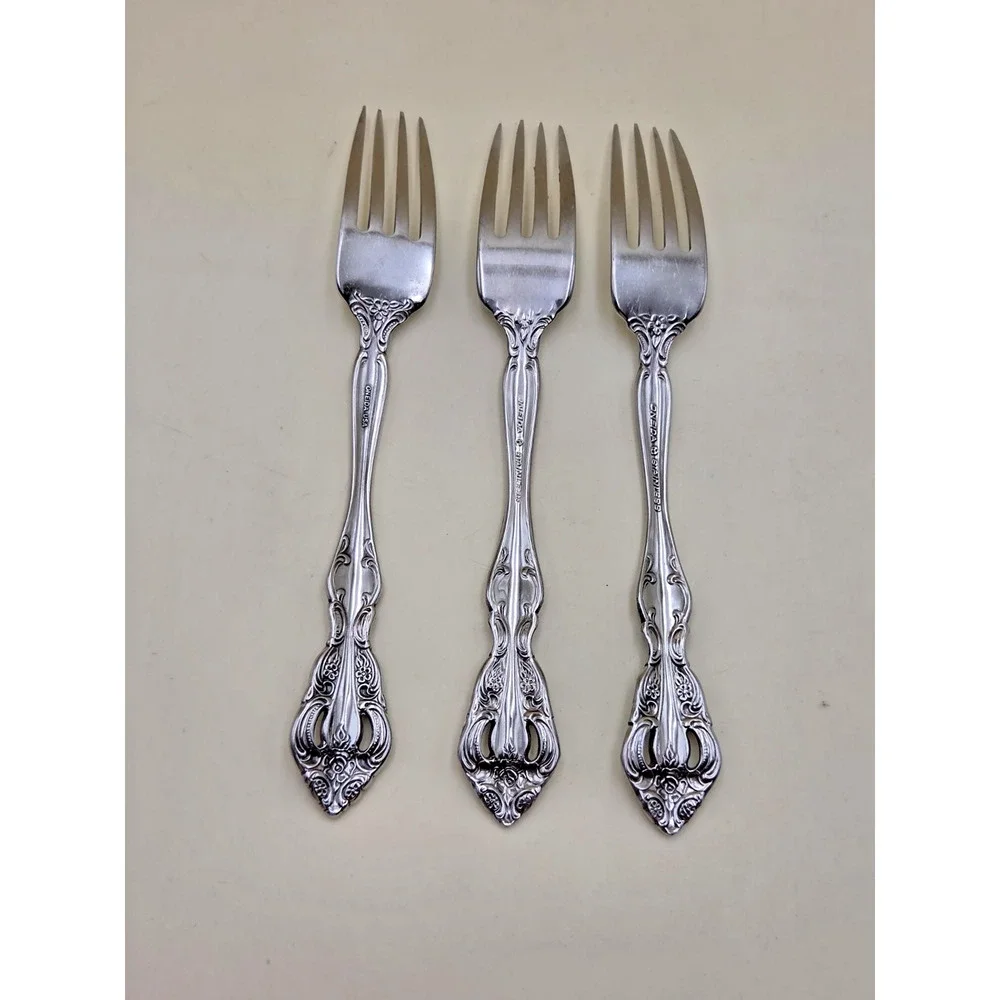 Set of 3 Oneida Michelangelo stainless steel dinner forks Silver